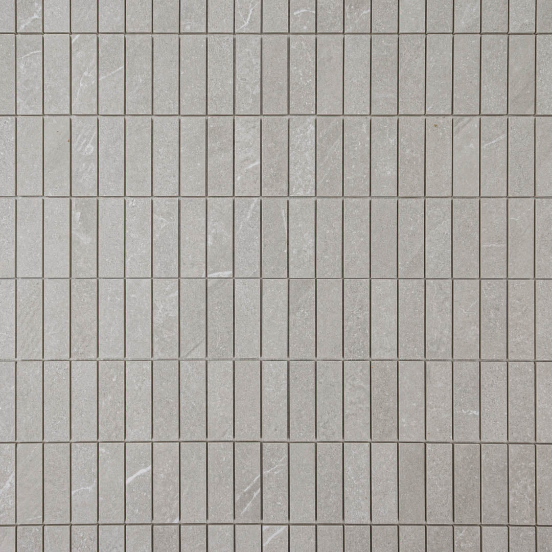 Ariel view of a limestone look mosaic in 1x3 chip shape with taupe and griege shades. 