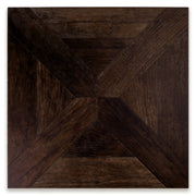 A single 19x19 parquet wood look porcelain tile in a rich chocolate brown. 
