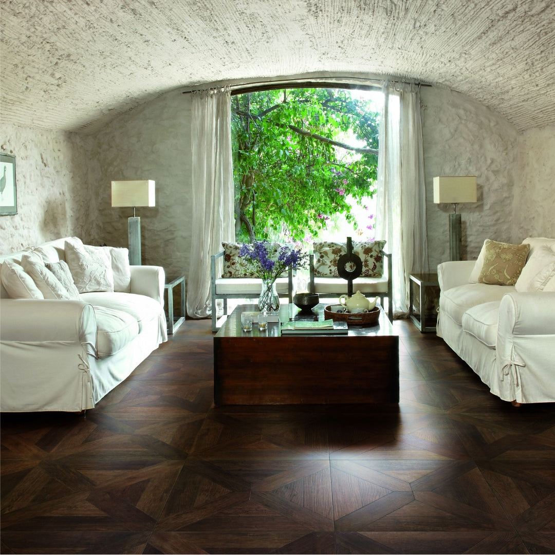 A transitional nature infused living space with white and creamy finishes. the floors are a parquet wood look 19x19 porcelain tile in a rich chocolate brown. 