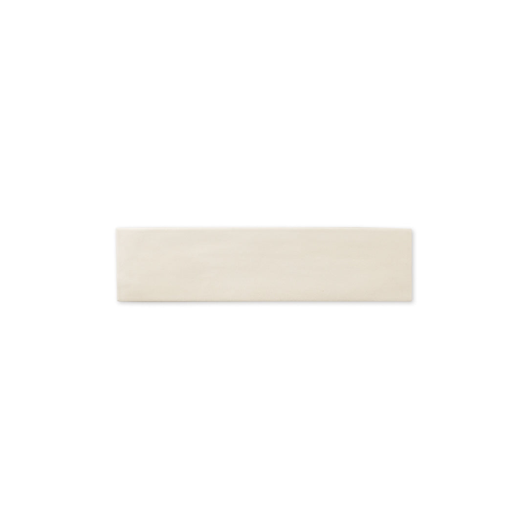 Single tile photo of a 2x9 matte subway tile in a soft beige shade with subtle texture.