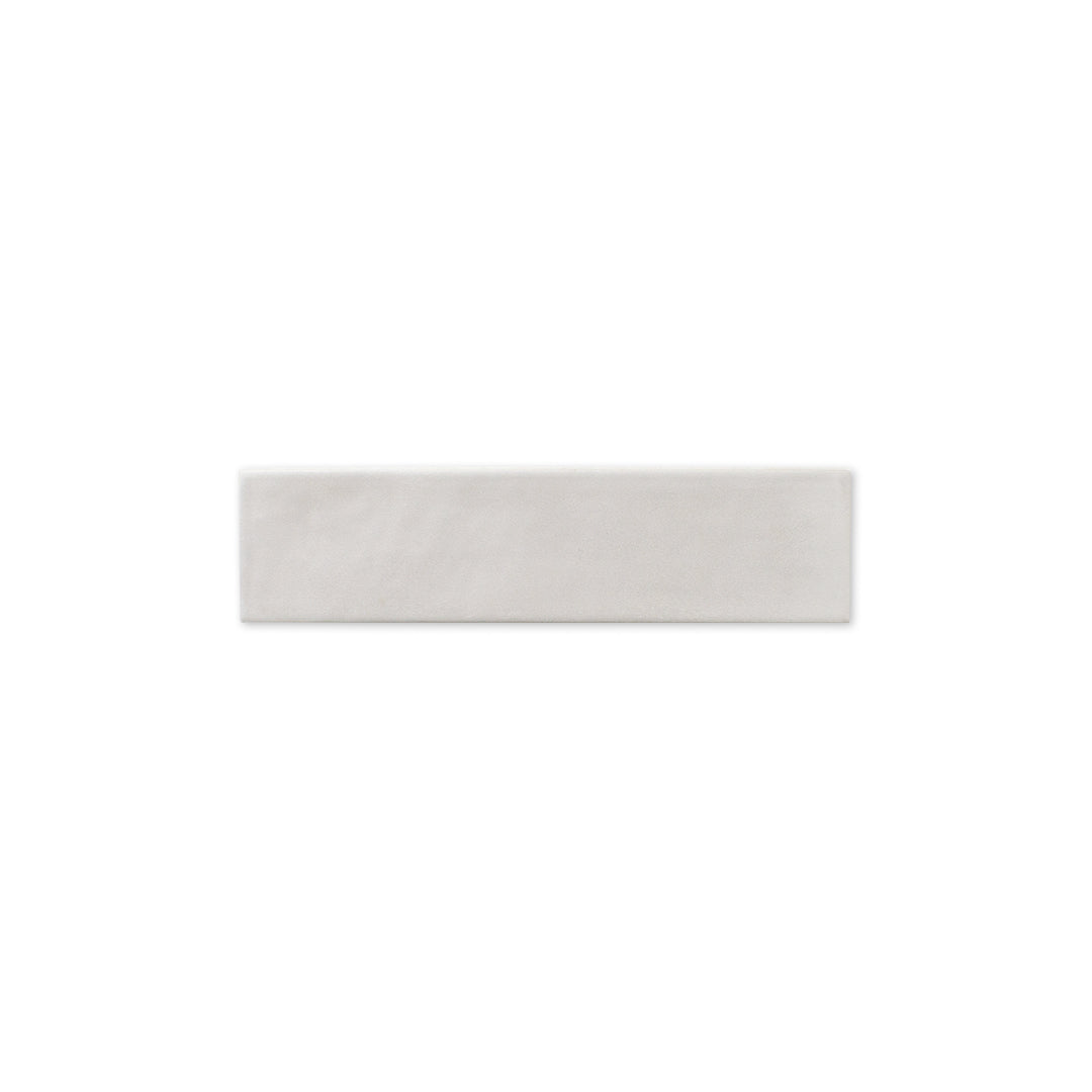 Ariel view of a 2x9 matte subway tile in a light grey shade with subtle texture.