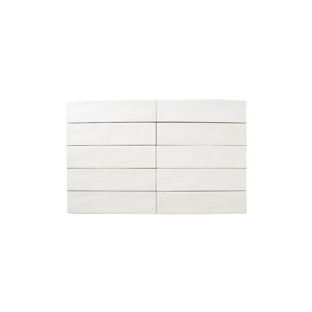 Product photo of a 2x9 subway white matte tile laid out in a horizontal stack. 