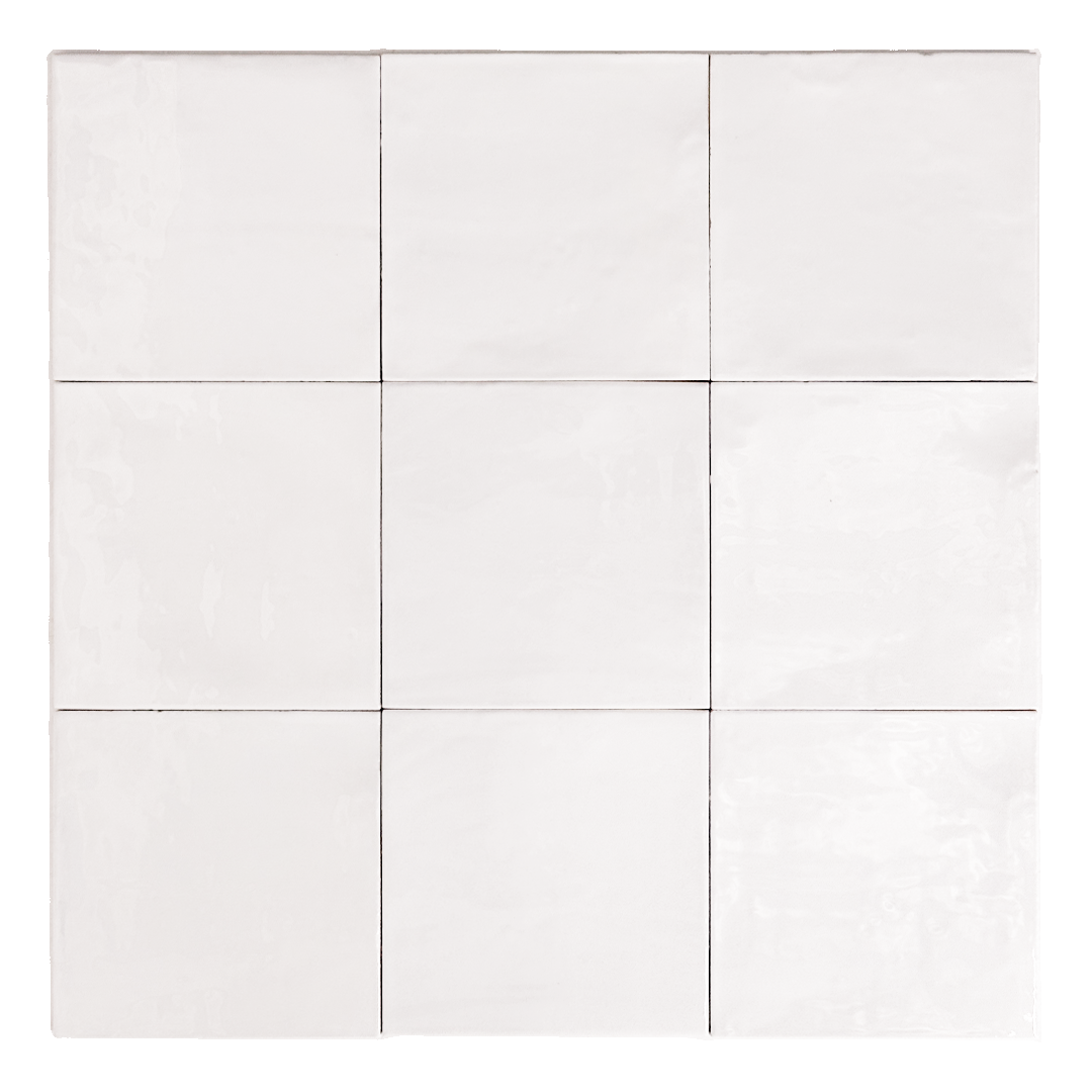 Ariel view of a group of glossy 5x5 textured white / offwhite zellige tiles showing the textured edges and colour variation. 