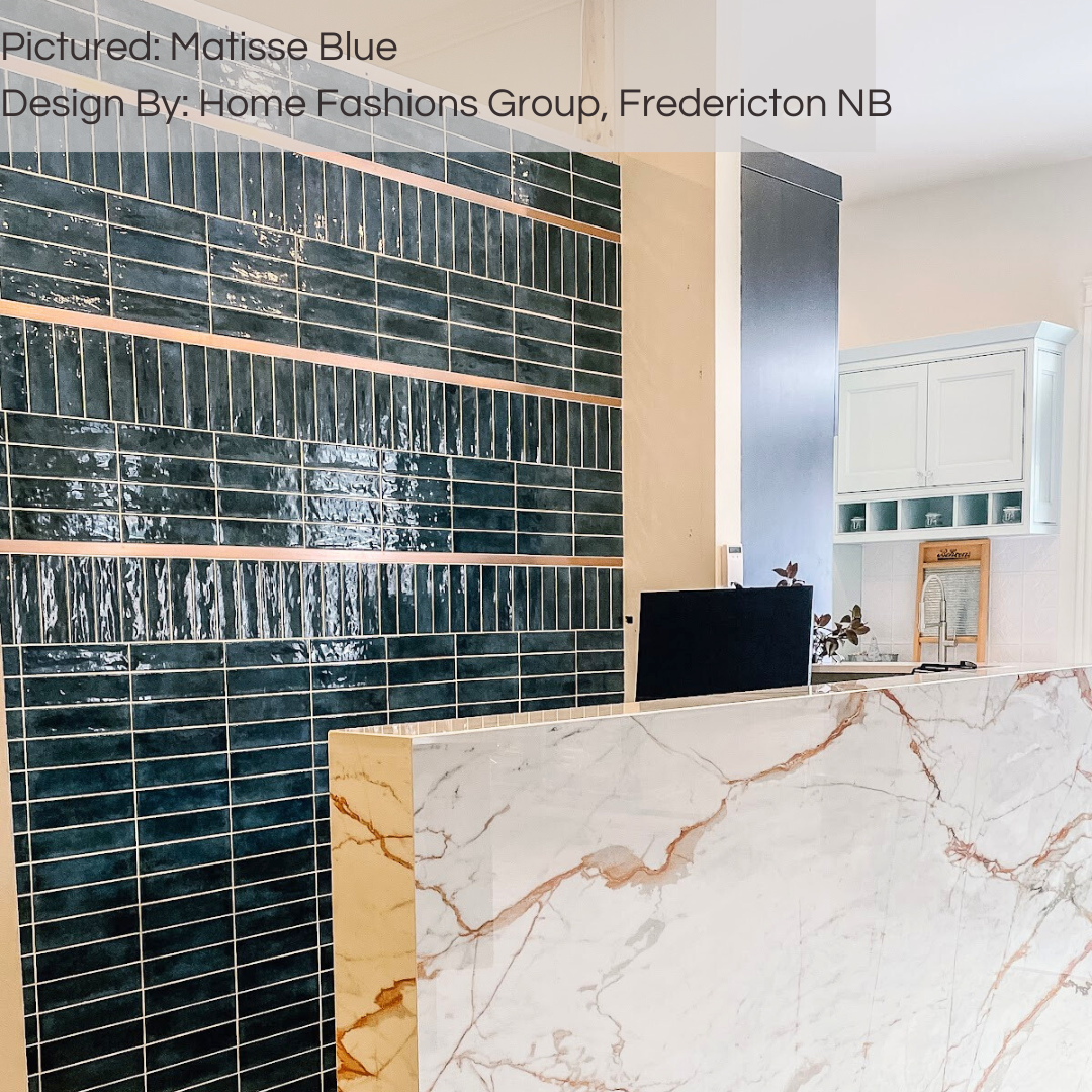 A retail accent wall installation of matisse blue 2.5x8 glossy tiles