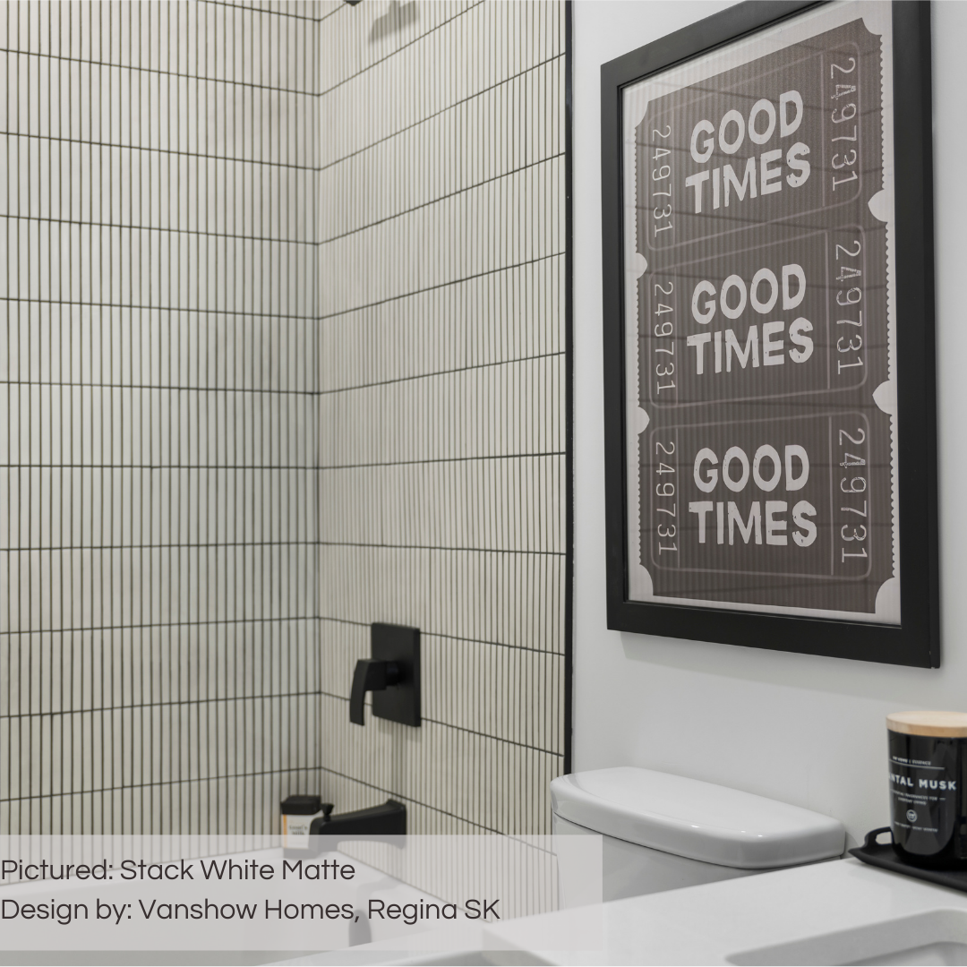A modern black and white bathroom with stack white matte kitkat mosaic tiles on the shower walls stacked vertically with dark grout giving much visual texture! 