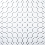 A zoomed our ariel view of a single sheet of Octa-Dot White, a classic timeless geometric pattern white octagon and dot penny mosaic tile. 