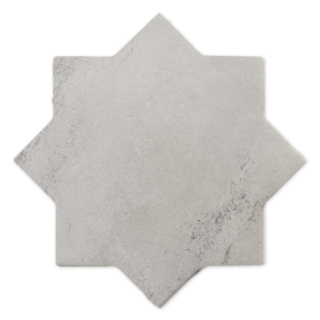 A star shaped tile in grey stone matte