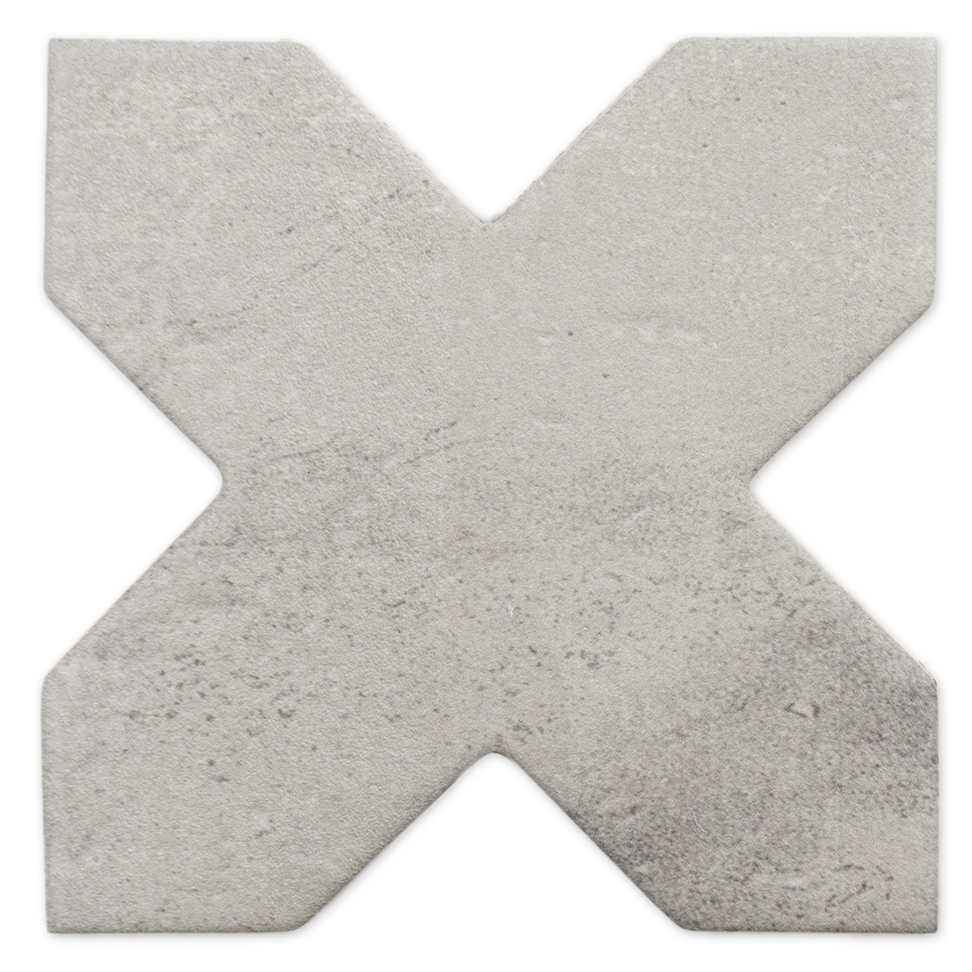 Cross shaped tile in a grey textured look matte