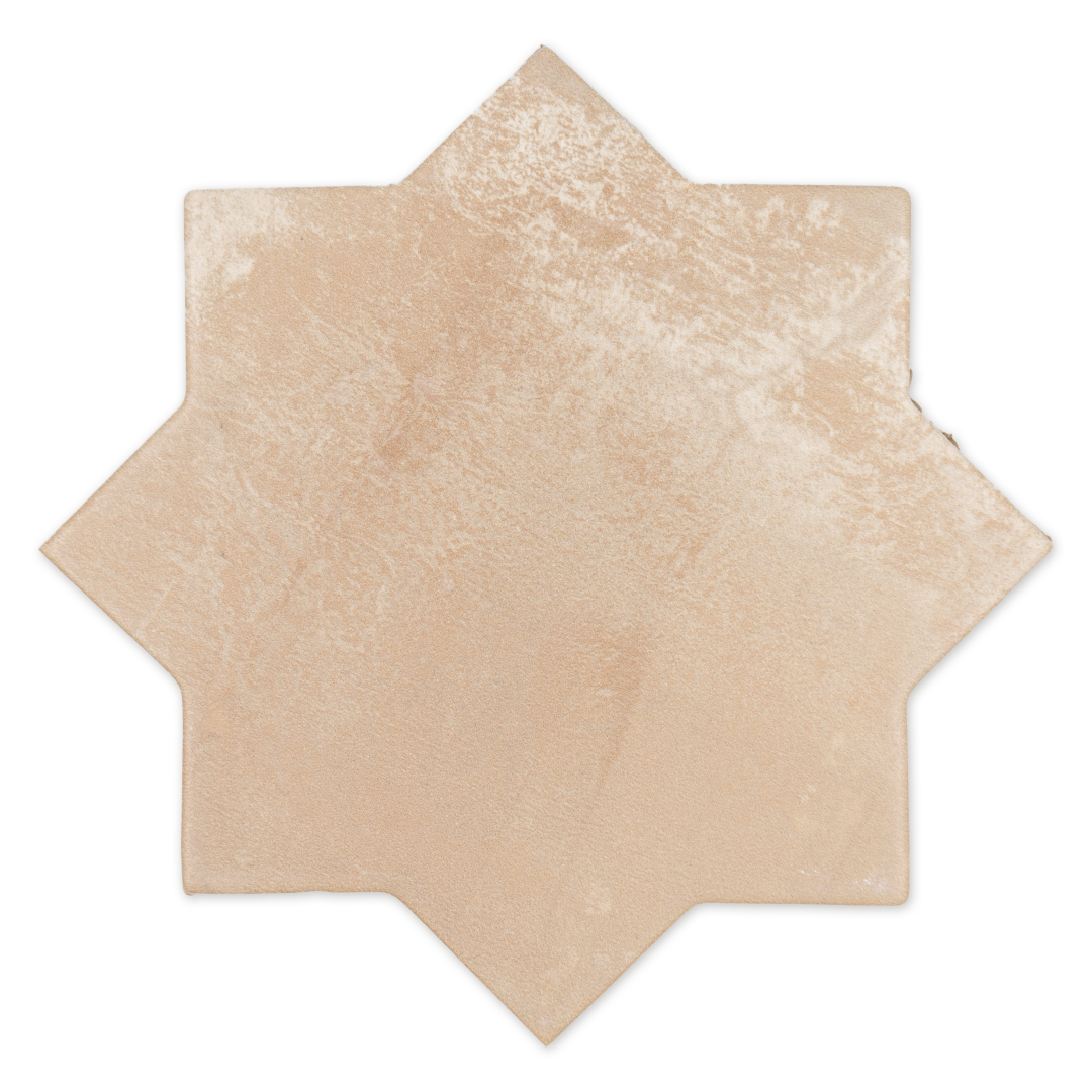 A star shaped tile in terracotta stone matte
