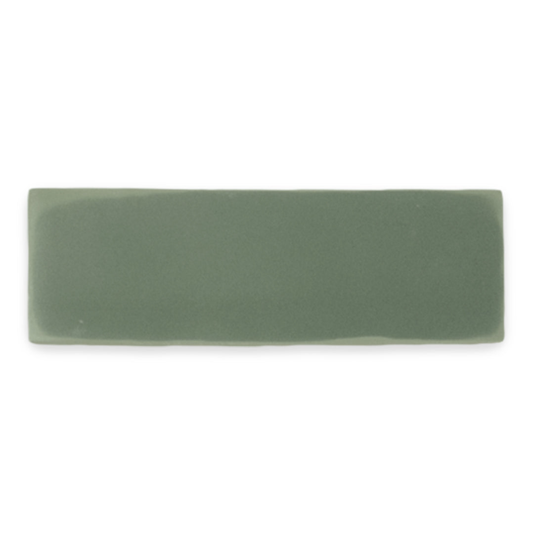 A single 2x6 matte dark green woodland fir tile
