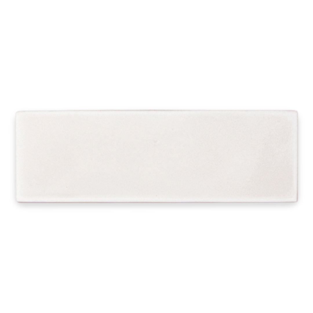 a single 2x6 matte cloud white subway tile