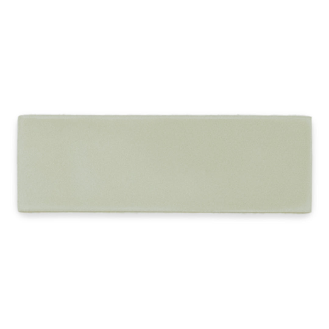 a single 2x6 matte light green sage tile