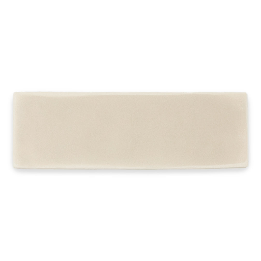 a single 2x6 beige woodland bark matte subway tile