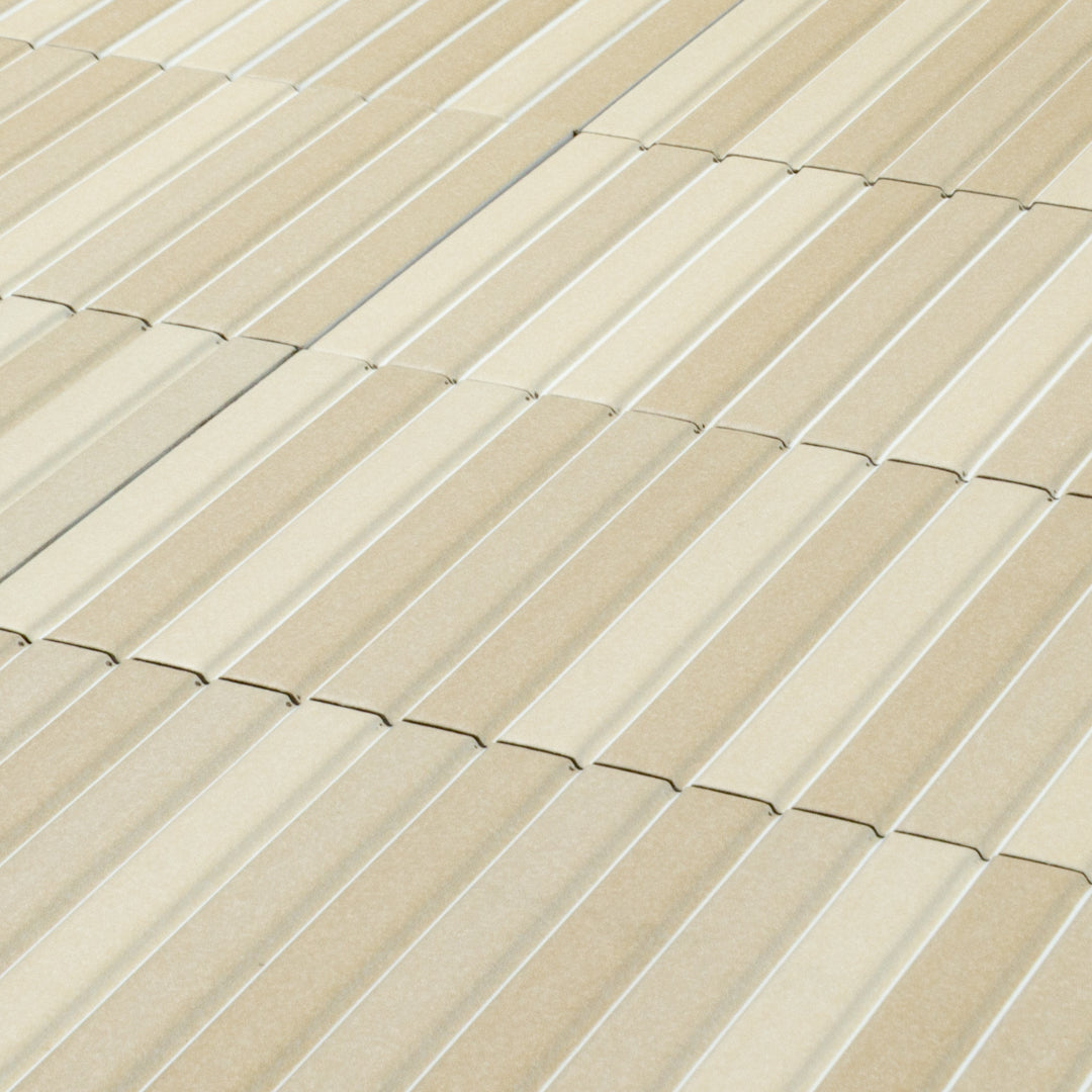 angled view of a group of kitkat style panels in matte beige with colour variaiton