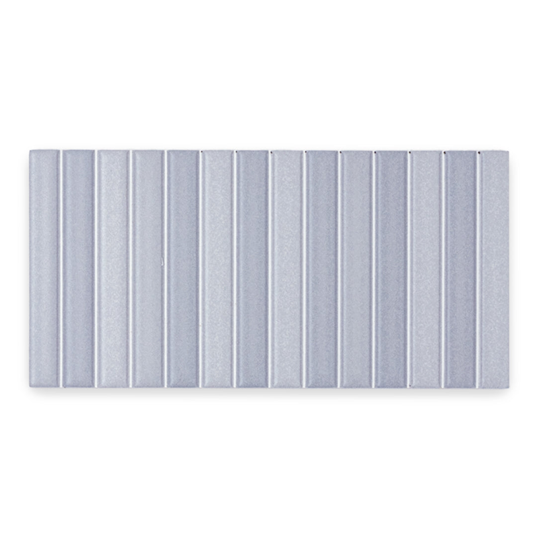 a single fluted cool grey blue kitkat style panel in a matte finish