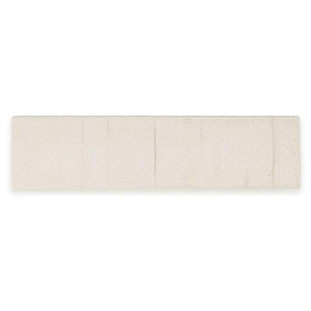 Ariel view of a single 3x12 textured off white beige tile.
