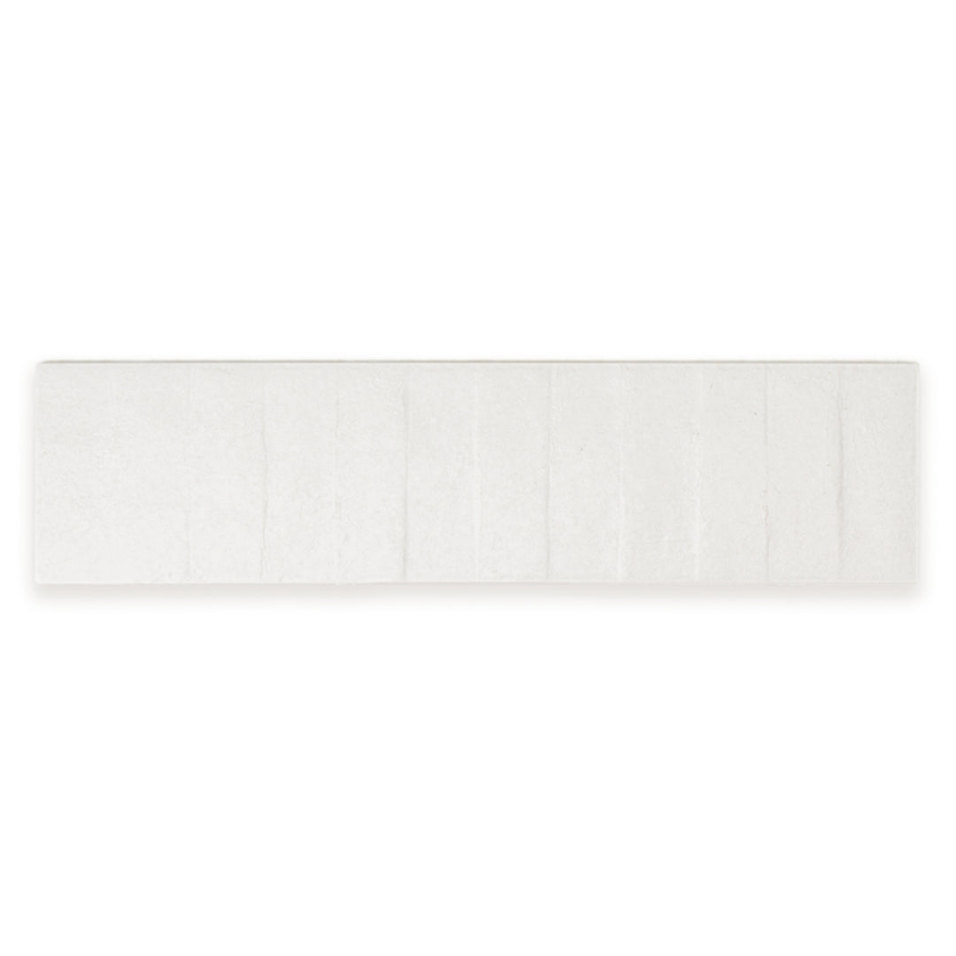 Ariel view of a single 3x12 textured white tile.
