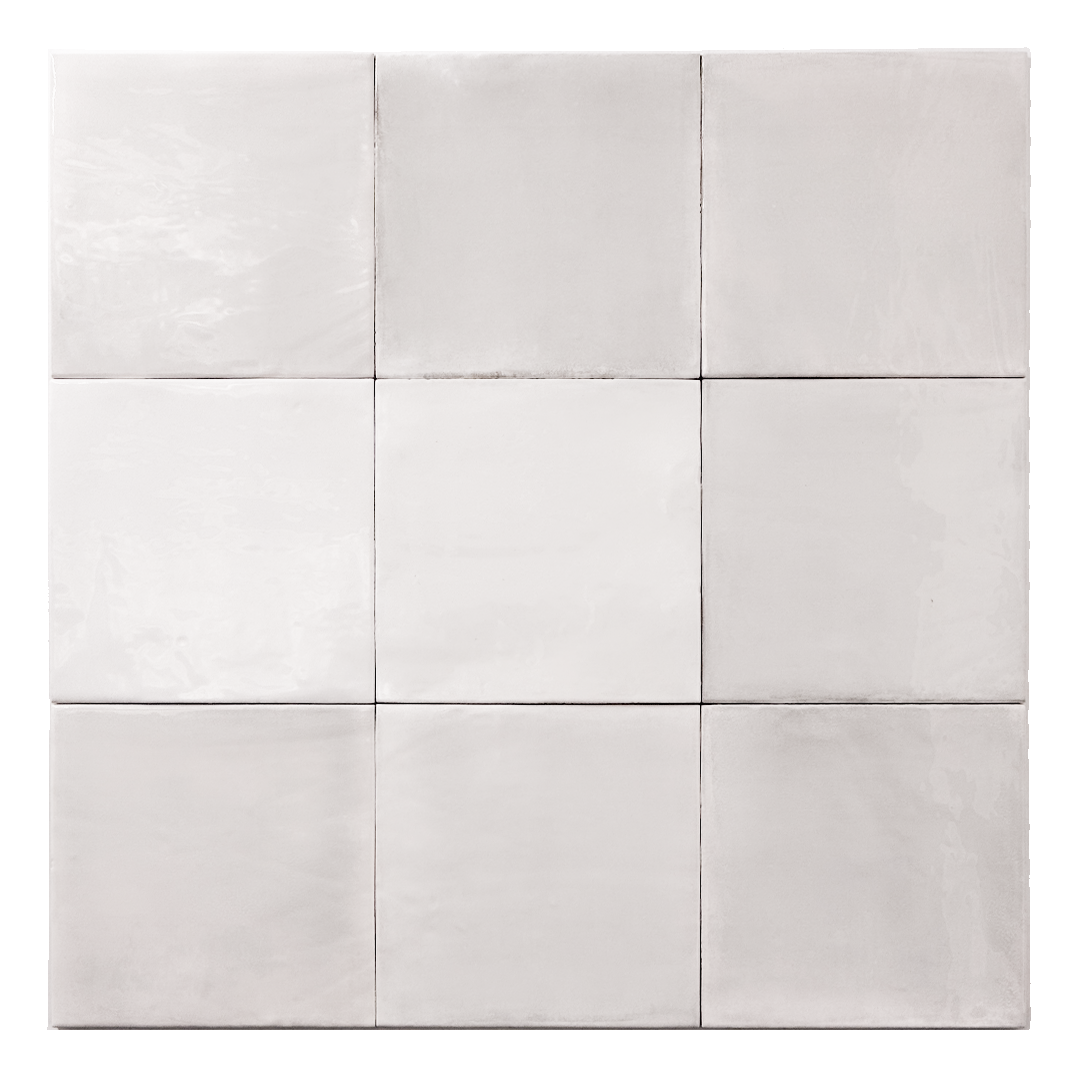Ariel view of a group of glossy 5x5 textured light grey zellige tiles showing the textured edges and colour variation. 