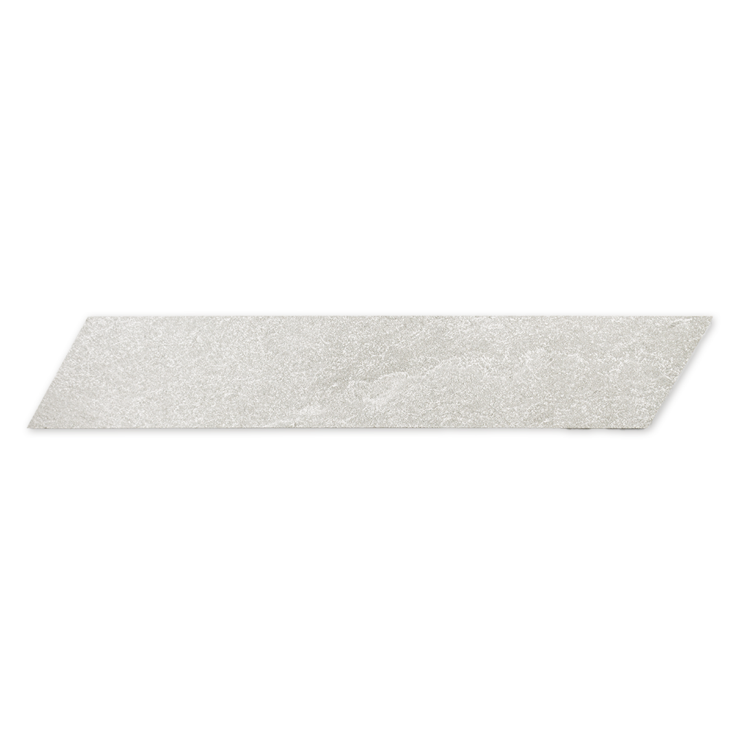 A single 4x20 white chevron stone look tile