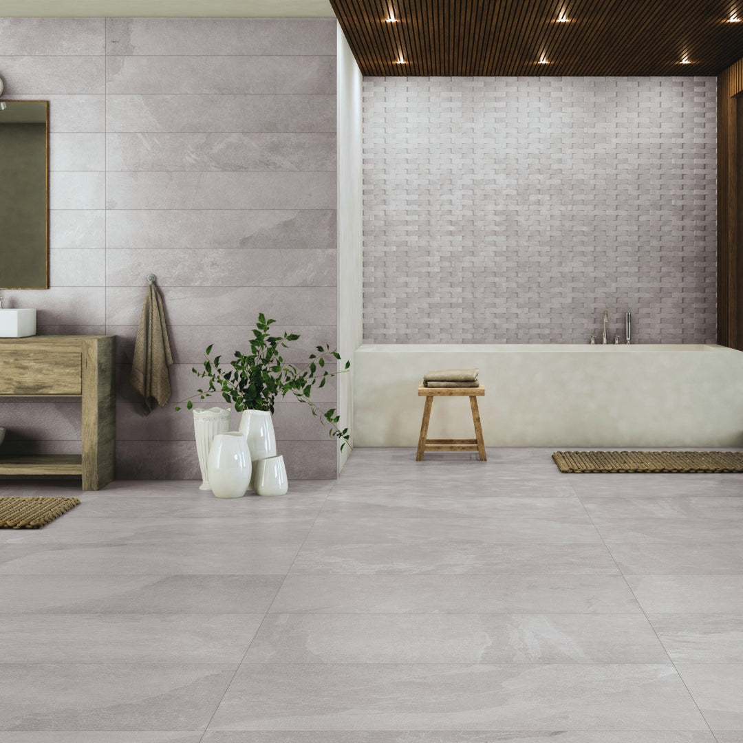 Large spa like bathroom using our Slate look White porcelain tiles on the floors and walls. Light wood accents and fixture compliments the light stone tiles. 
