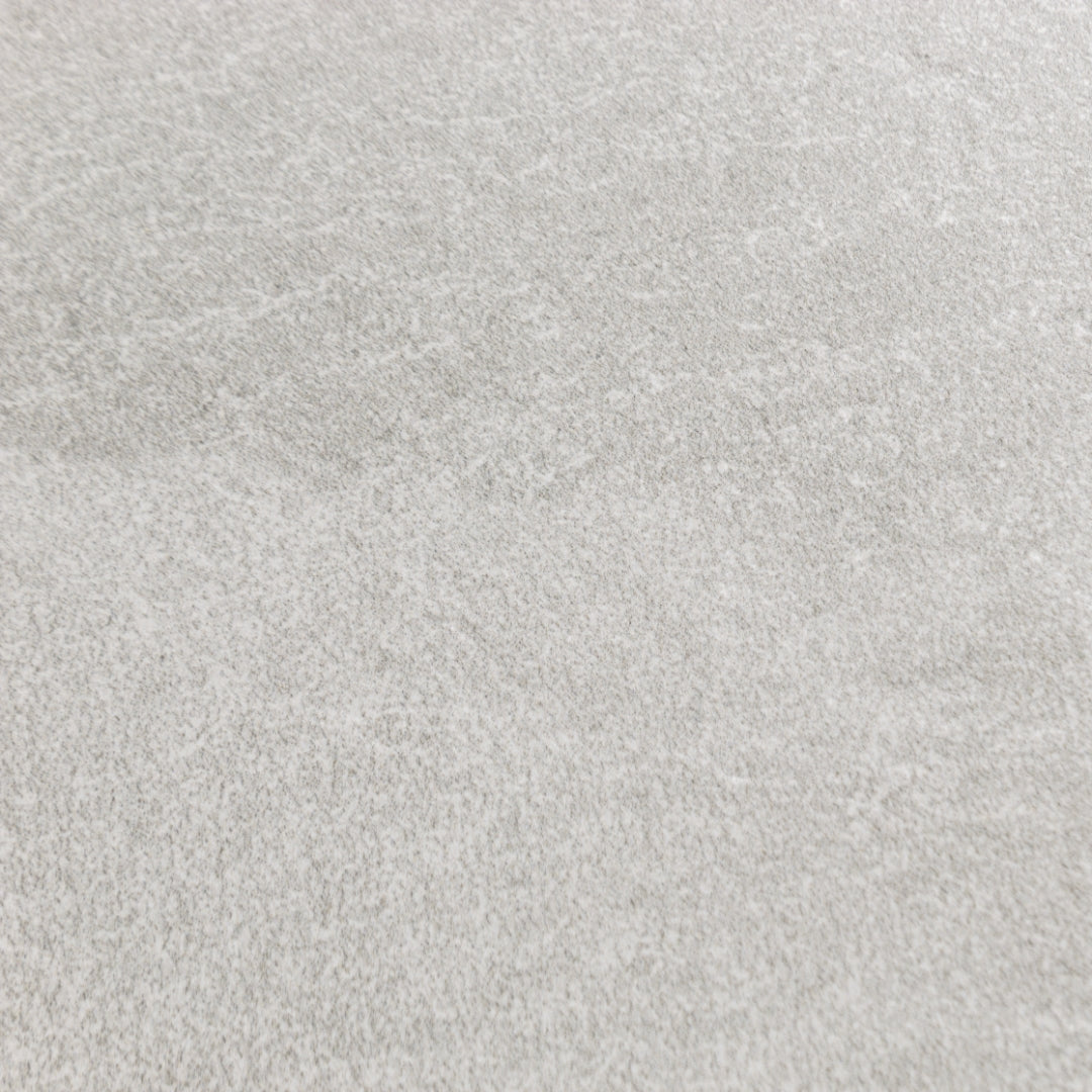 Ariel close up of slate frost white to highlight the finish, subtle grey pattern, and colour. 