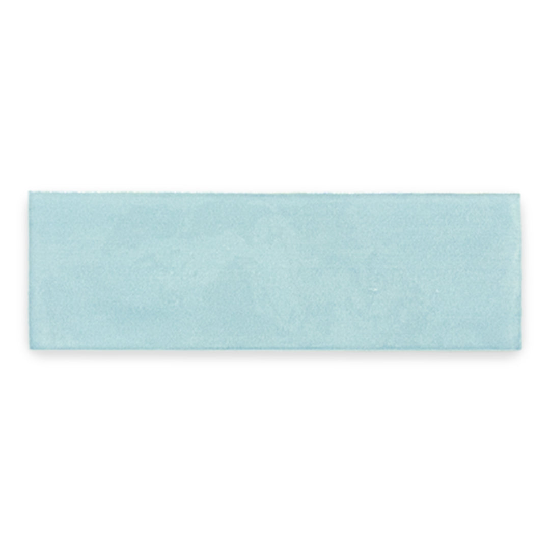 A single 2x6.5 glossy light blue subway tile, this collection has a strong colour variation and this looks to be the lightest shade. 