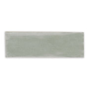 A single 2x6.5 glossy aquamarine blue green seaglow seaglass subway tile. 
