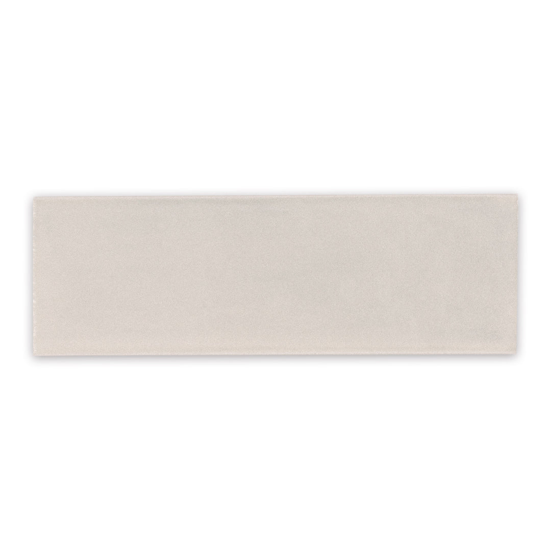 A single 2x6.5 glossy subway bars tile in biscuit beige sepia
