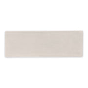 A single 2x6.5 glossy subway bars tile in biscuit beige sepia