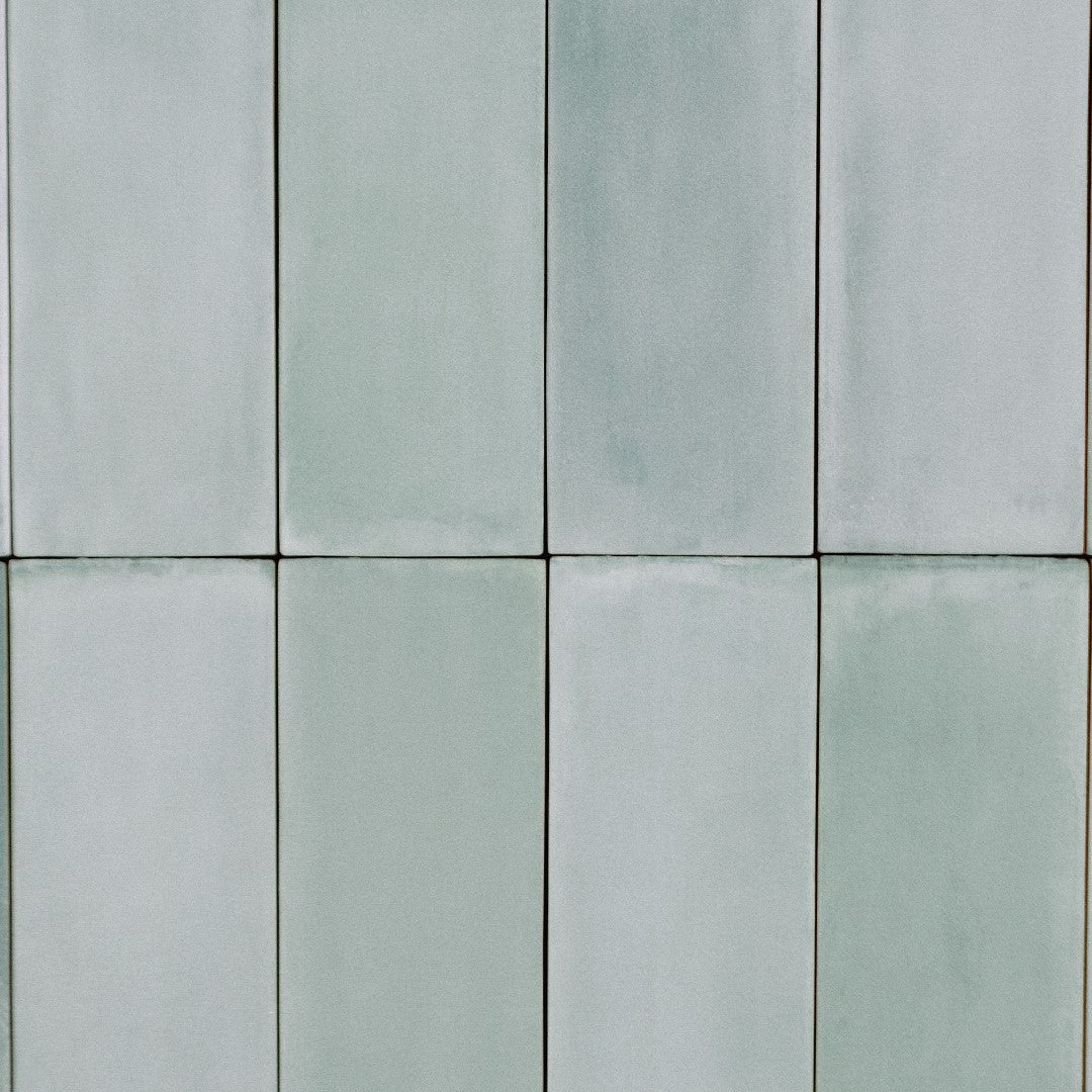 Ariel view featuring 2x6.5 seaside bars in a stack grouping; a matte light sage green tile with heavy colour variation. 