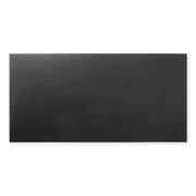 A single tile of black 12x24 tile, checkmate black features a slight stone look, with subtle texture and a matte finish. 