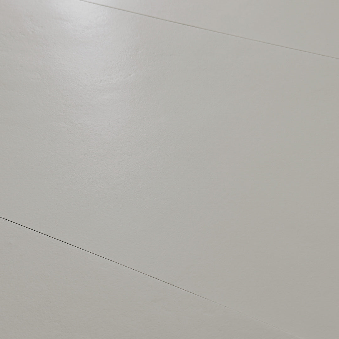 A close up view of the 12x24 grey tile highlighting the soft stone appearance and texture. 