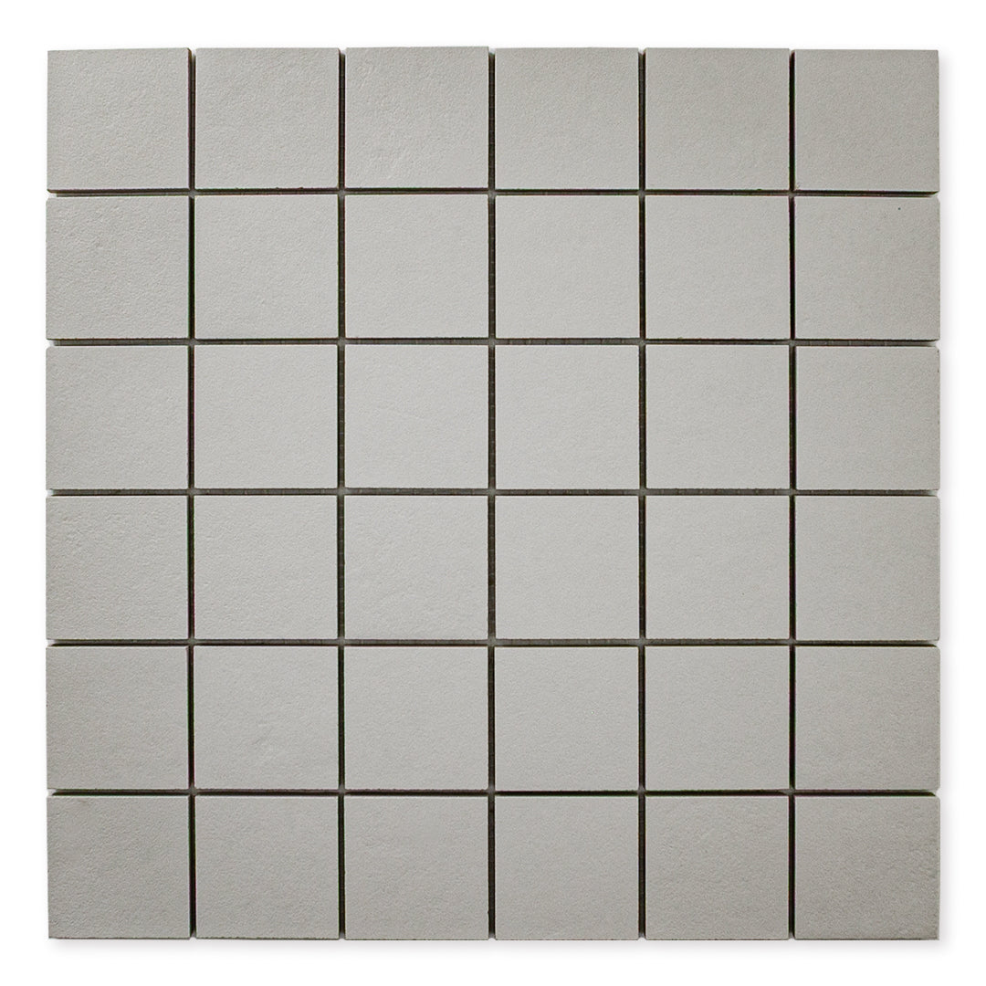 Ariel view of the 12x12 sheet mosaic tile made of 2x2 grey stone look tiles