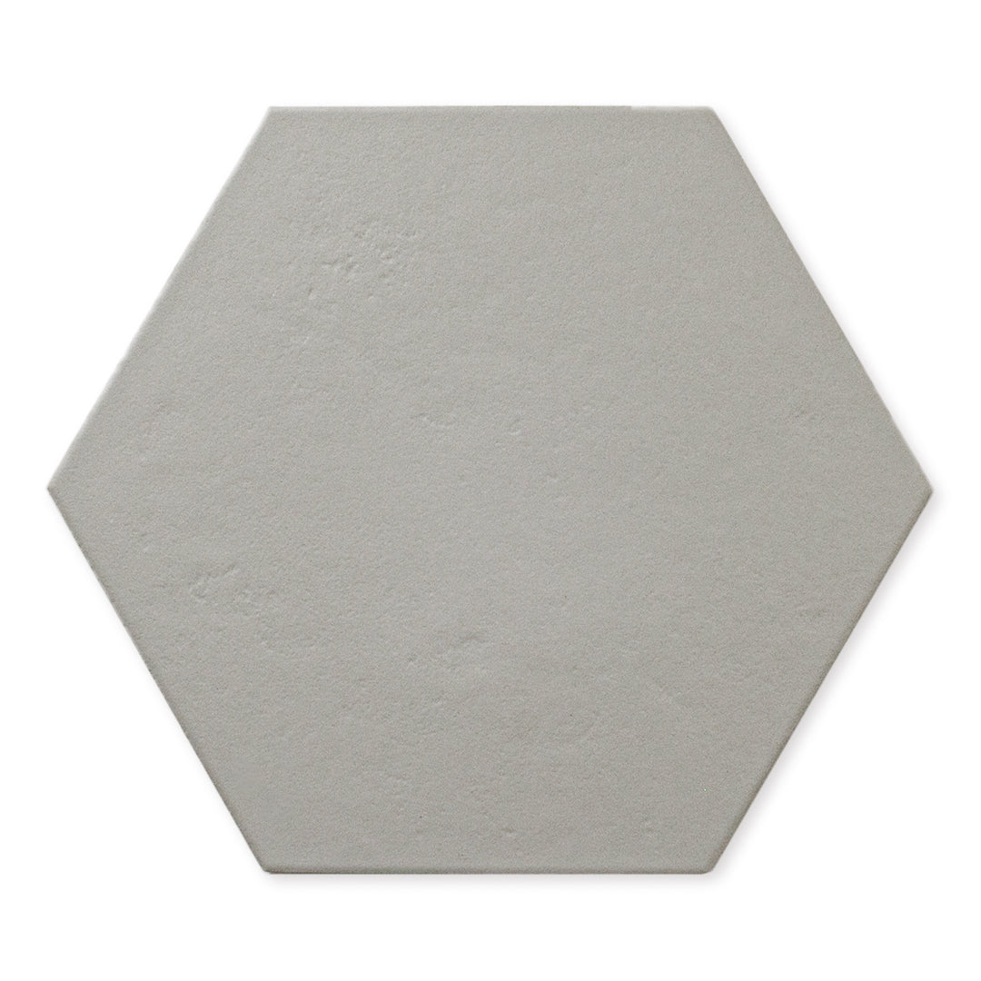 A single 9x10 hexagon tile that is grey with a subtle texture and matte finish.