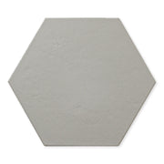A single 9x10 hexagon tile that is grey with a subtle texture and matte finish.