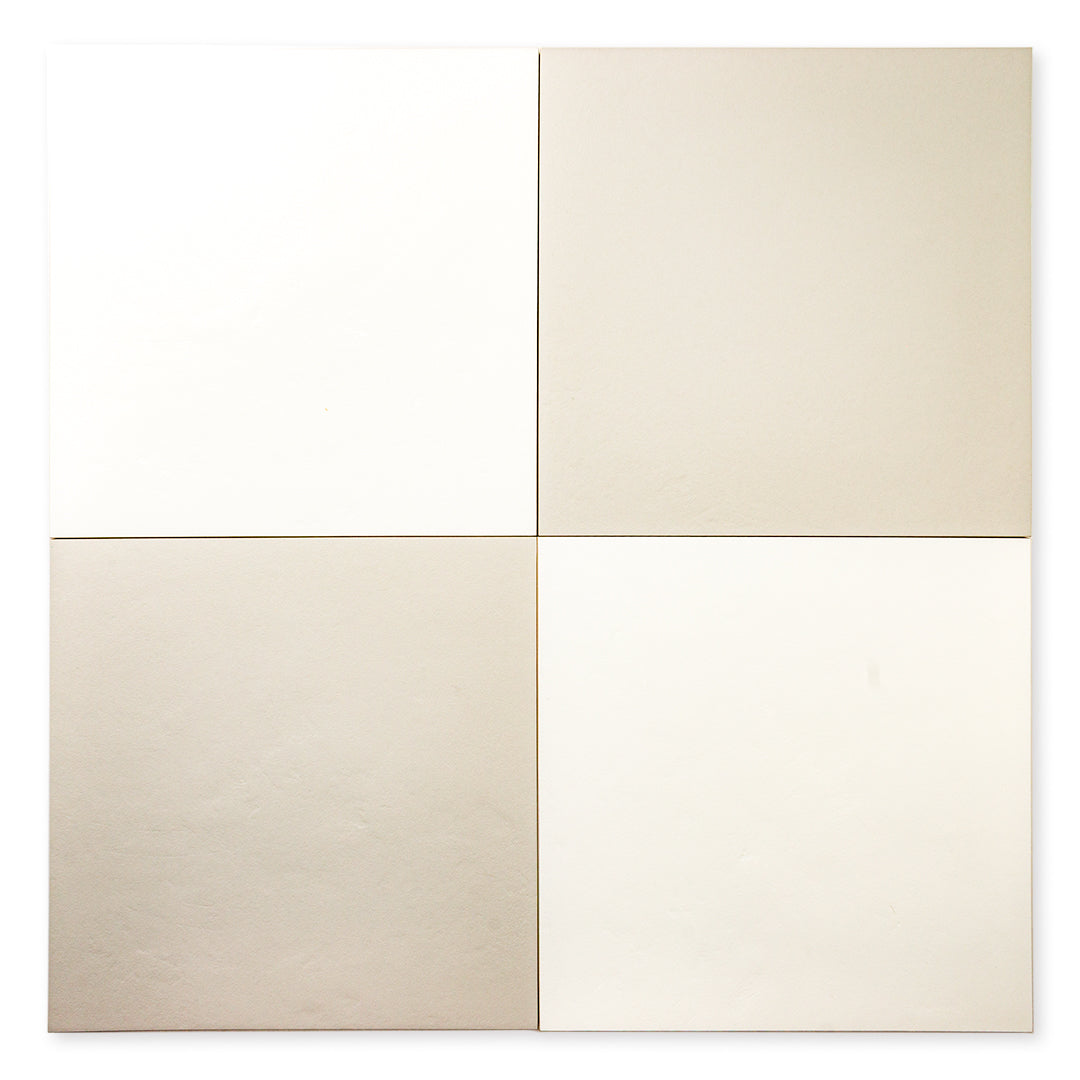 Ariel view of Grey and white 12x12 tile ariel view of four square checkerboard tiles together with a soft stone appearance and texture. 