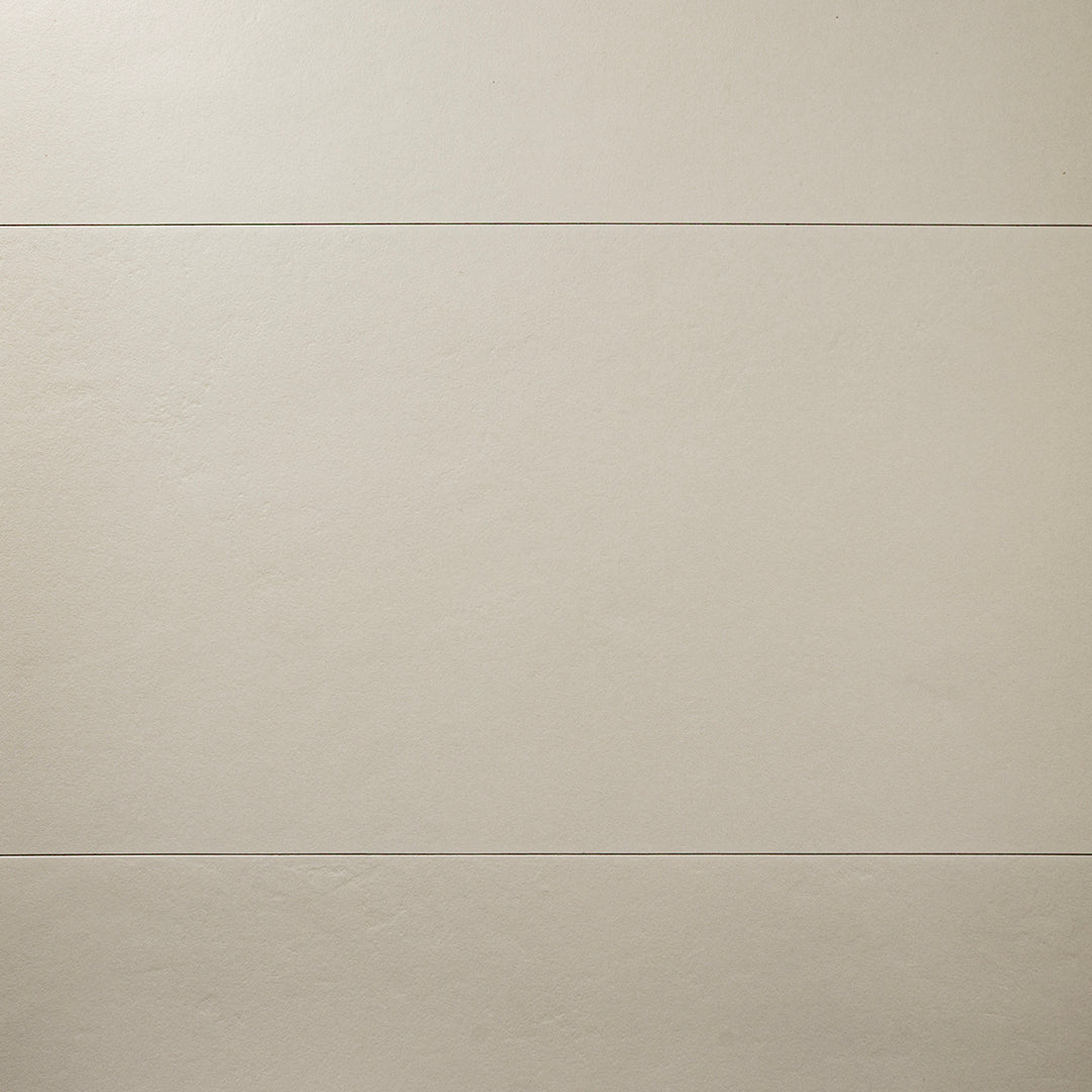 A close up view of the 12x24 beige tile highlighting the soft stone appearance and texture. 