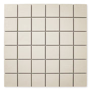 Ariel view of the 12x12 sheet mosaic tile made of 2x2 beige stone look tiles