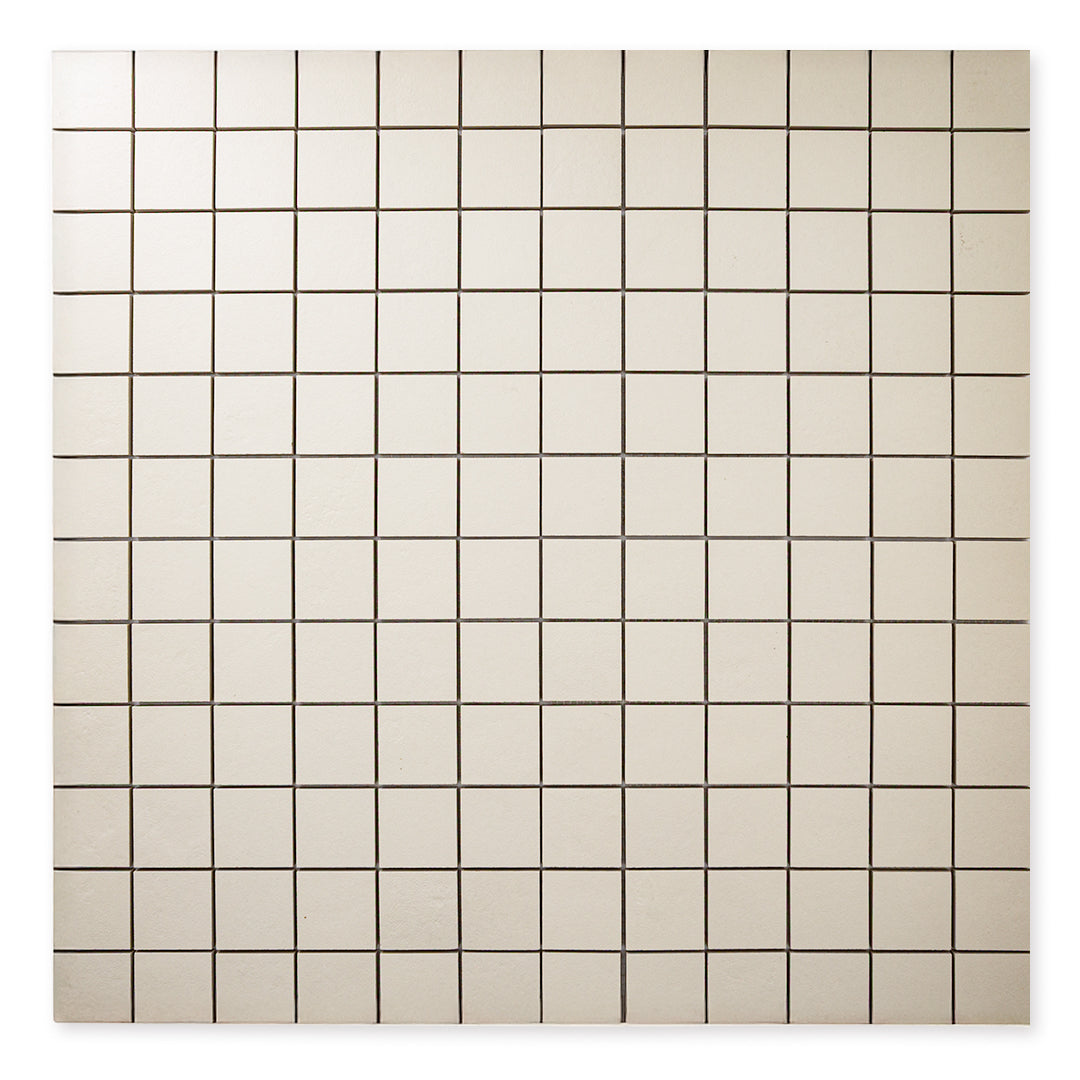 A far away ariel view of the 12x12 sheet mosaic tile made of 2x2 beige stone look tiles with a subtle texture