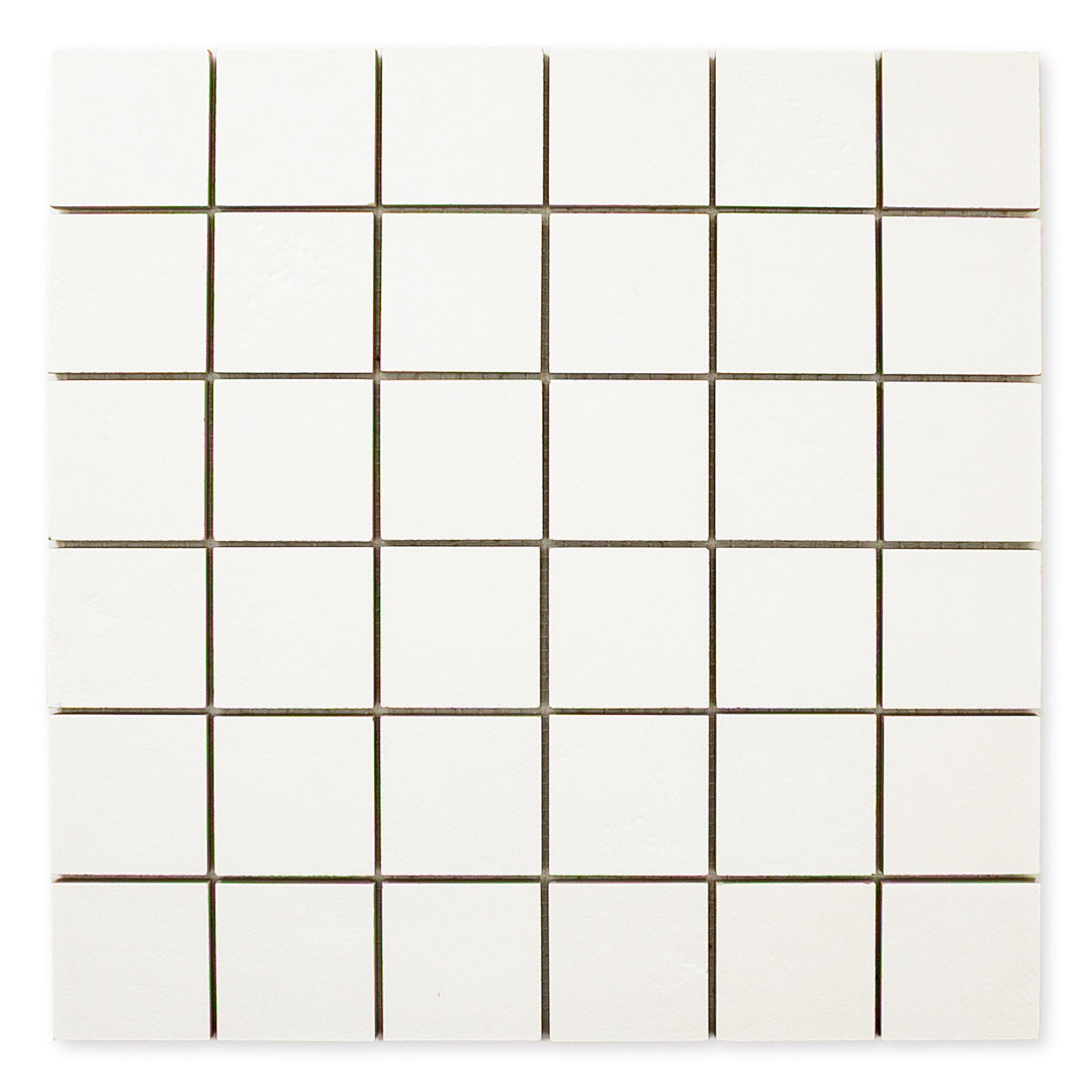 Ariel view of the 12x12 sheet mosaic tile made of 2x2 white stone look tiles