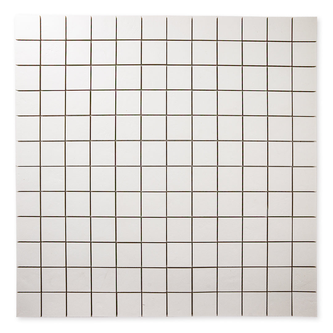A far away ariel view of the 12x12 sheet mosaic tile made of 2x2 white stone look tiles with a subtle texture