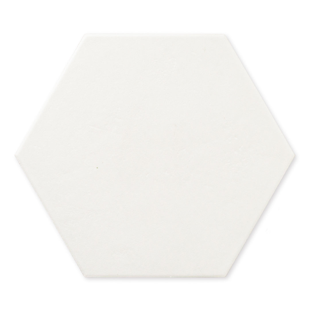A single ariel view of white 9x10 hexagon tile, checkmate white features a slight stone look, with subtle texture and a matte finish. 