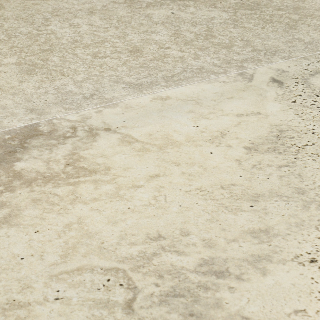 Angled close up two large rectangular 24x48 tile that resembles travertine stone in light warm greige. 