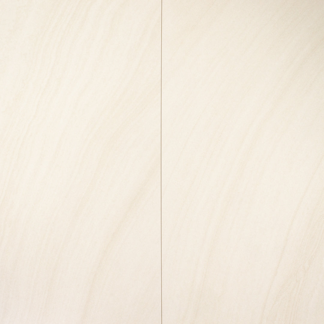 ariel view of two tilesinspired solenne beige stone look rectangular tiles and where the meet to show the pattern doesn't exactly line up but it is so subtle that it flows anyways. 