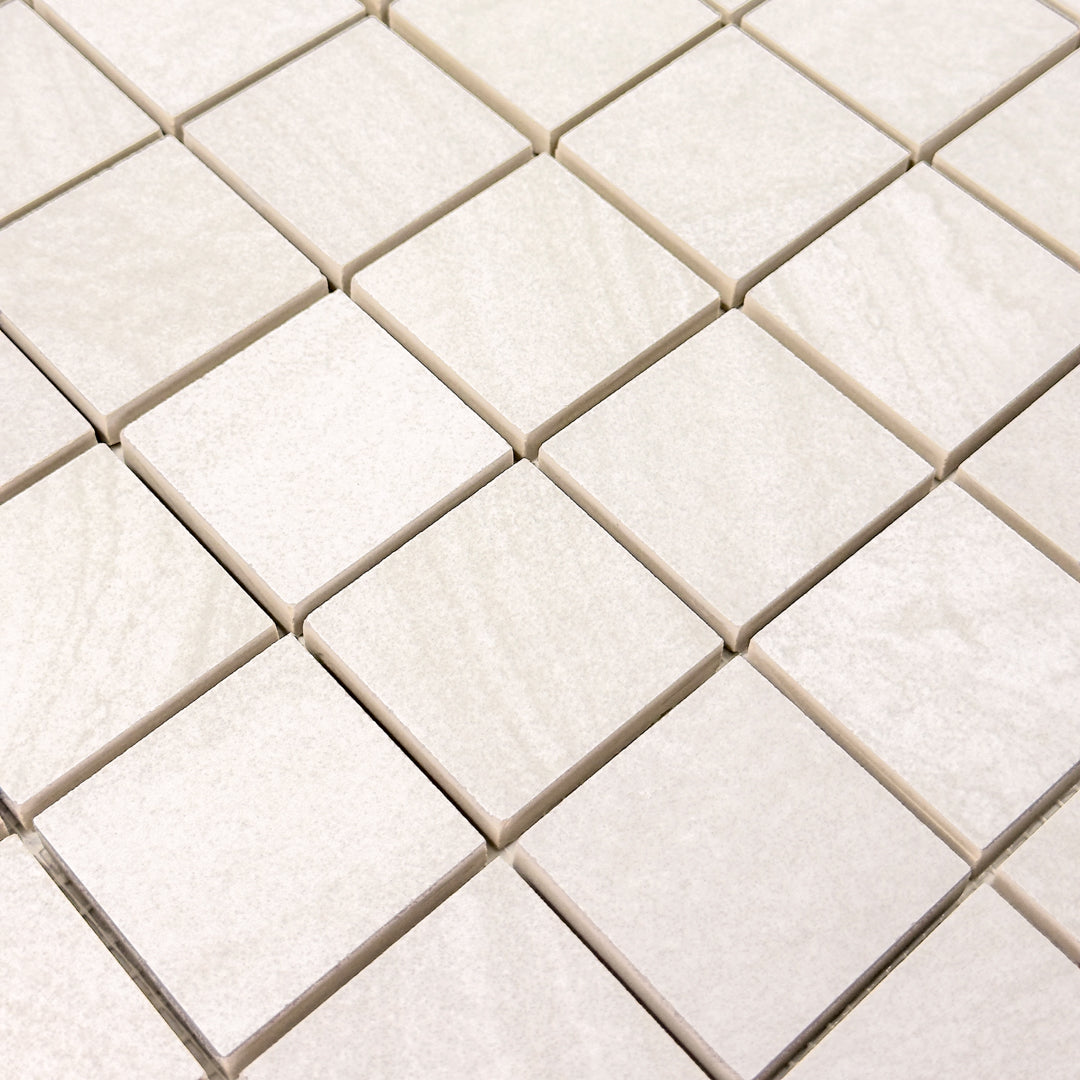 tilesinspired solenne white 2x2 mosaic has a very subtle veining stone look 