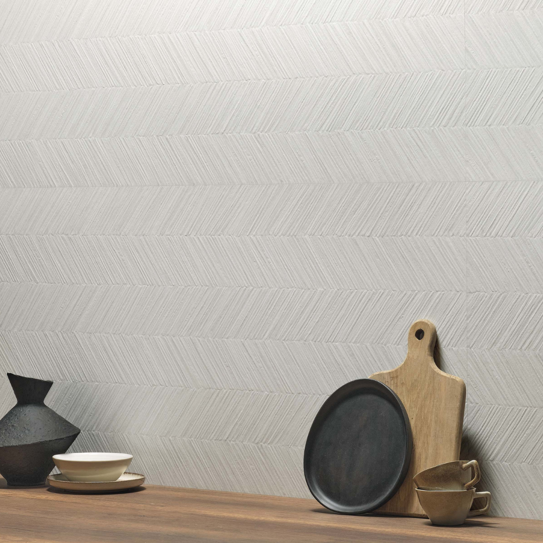 a backsplash using ilesinspired grey solenne structured chevon stone look tiles. a subtle pattern but so much visual texture perfect for a minimalist look. 