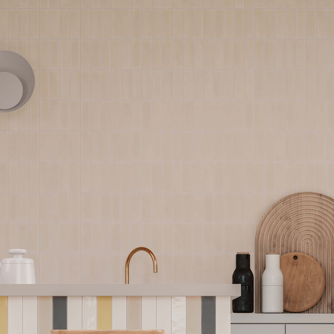 A minimalist kitchen with a large wall of tiles backsplash using 2x6 taupe matte subway tiles. they are woodland truffle with a subtle colour variance. 