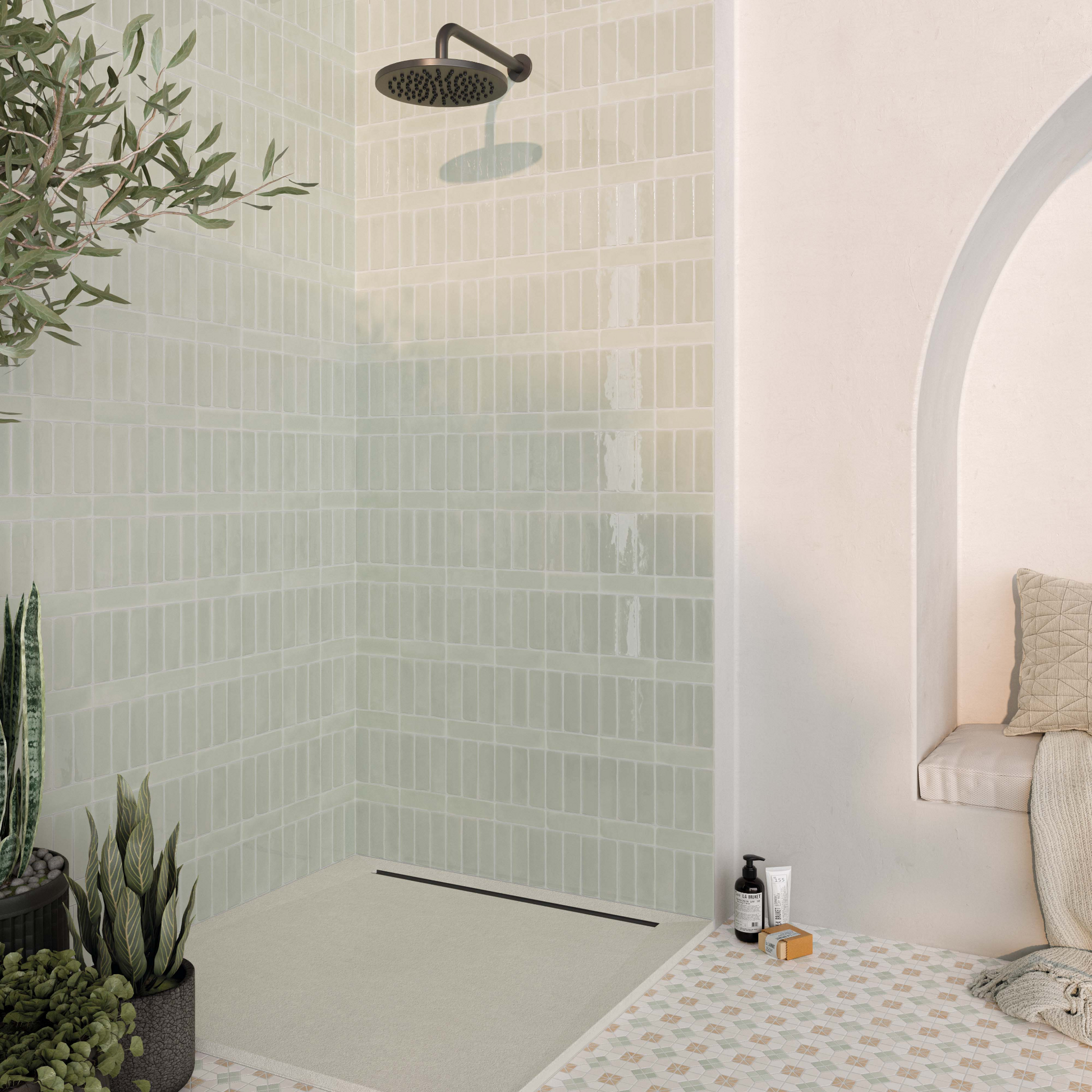 A light and airy ensuite walk-in shower with a lovely tiled shower mixing both glossy and matte light sage green subway 2x6 tiles. 