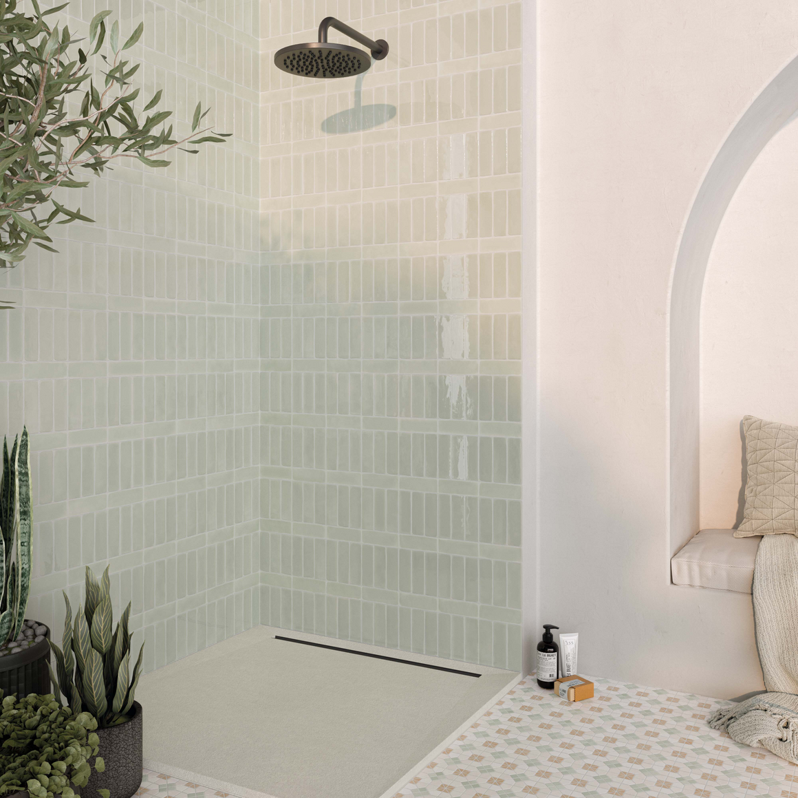 a group of light green sage2x6 matte subway tiles with a soft texture and variance in a brick layout. 