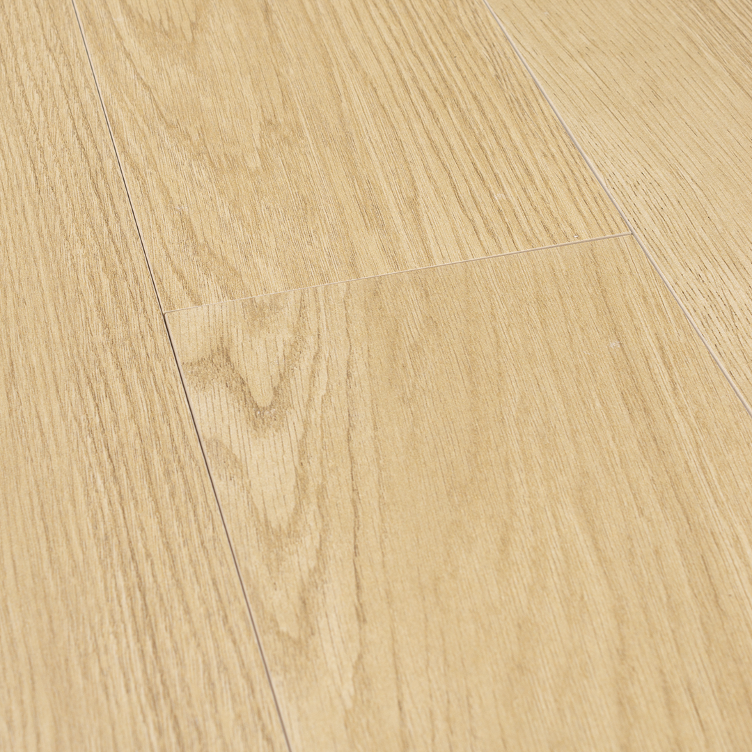 angled ariel view of a group of 6" X 35" vanilla wood look plank tile for floors or walls laid out in a brick pattern to show the grain pattern, and matte finish and texture. 